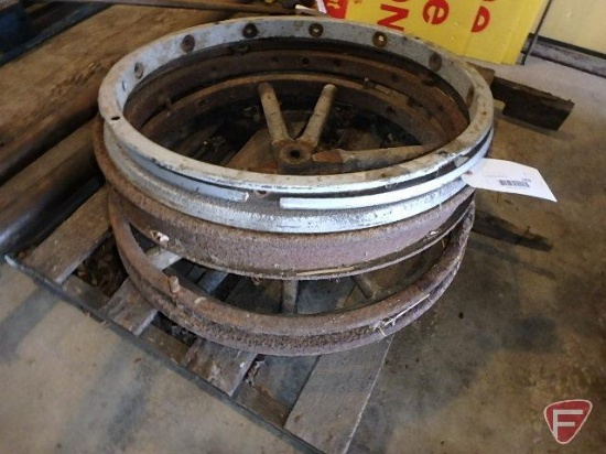 (4) wheel rings, one with partial wood spokes