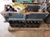 Engine block with (1) cover, pistons, sn unreadable