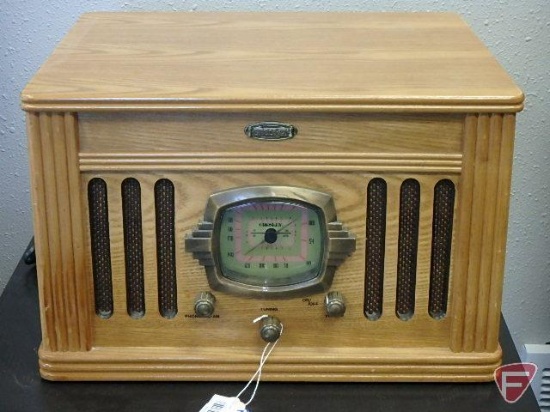 Crosley vintage-look compact stereo, radio, cassette player and turntable. 11InHx18inWx14inD