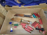 Hunting knives, 12 ga. shells, dice, compass, hourglass