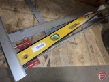 Sheetrock squares, level, clamps