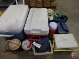 Pallet of coolers and watering cans