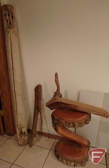 Wood items, unique table/chair, (2) carved face pieces, and wood post. 4 pieces