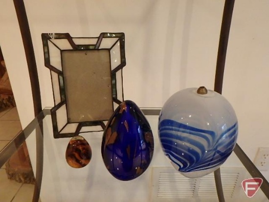 Slag glass frame , glass paperweights, and glass oil candle. 4 pieces