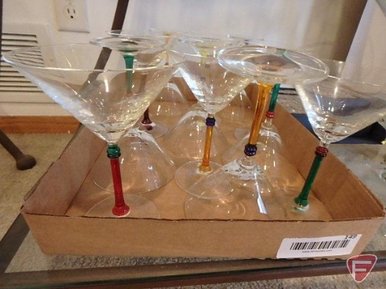 Set of 12 glass stemware with colored stems, (2) pedestal centerpiece bowls, and set of glass cubes.