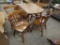 Wood 41in round table with drop leaves, (1) 15.5in leaf and (4) matching wood chairs