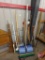 Yard and garden tools, shovels, rake, brooms, roof rakes, yard sticks, hoe, medal stand.