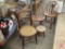 (2) matching wood chairs, (1) wood chair with rattan seat, (1) upholstered seat wood rocking chair,