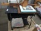 Metal rolling desk with pullout tray, 28inHx30inWx16inD, fabric cement sacks, wood hanging coat