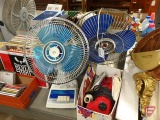 (2) table fans, Tatung and Super Deluxe, and Dirt Devil hand vacuum.