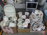 Holiday dishware, Gibson and Home, not all matching, sets may not be complete. Contents of 3 boxes