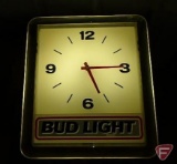 Bud Light wall clock, 19inHx17inW, lights but not sure on clock movement, and