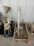 Vintage wash plungers, croquet set, horse evener, grate cover, pulley wheels, bell, hand tools.