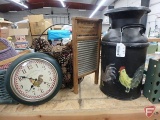 Metal egg basket with pine cones, wall clock, painted cream can and