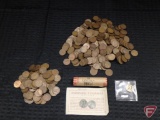 Approximately 500 loose unsearched Lincoln wheat pennies, one unsearched roll of Lincoln wheat