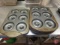 (10) Wilton donut pans and (1) Norpro donut pan