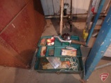 Metal tackle box with fishing rods, life vest and some tackle