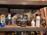Metal shelving unit, approx. 36inWx20inDx71inT; includes assorted grease, aerosol paint, oil