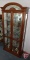 2 door cabinet with glass shelves and beveled mirrored back, some minor scratches, lighted