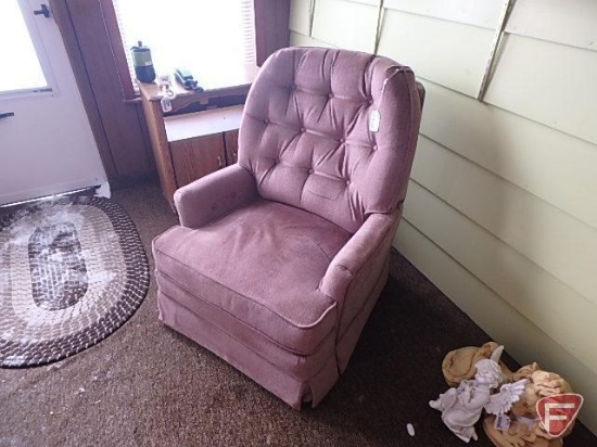 Upholstered recliner armchair