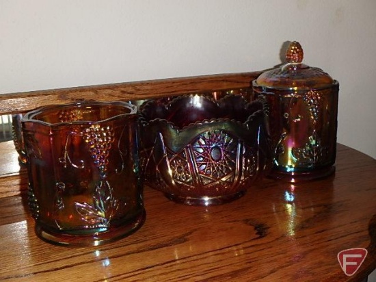 Carnival glass canisters, one piece missing top