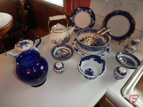 Blue willow dishes, salad bowl, plates, and others; not all matching, but done in blues