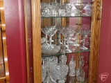 Clear glass stemware, salt and pepper, vinegar cruets; 3 shelves
