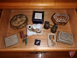 Winchester belt buckle, Mini Gasco Lamplighter pin, jack knives, binoculars, and trinket boxes