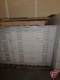 15-drawer blueprint file cabinet with sample newspaper printing plates, some unused