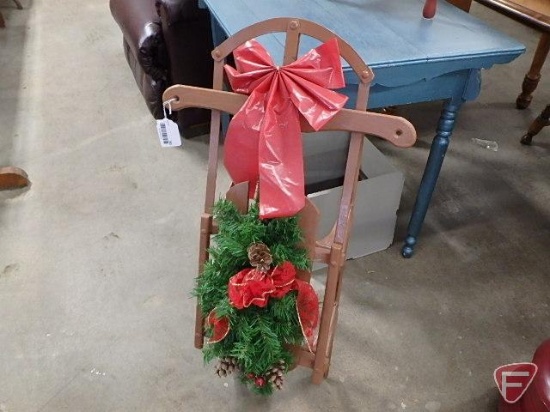 Painted wood and metal sled, 32inL, with holiday decoration