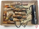 Deer, duck and quail calls, and Delta Waterfowl flashlight