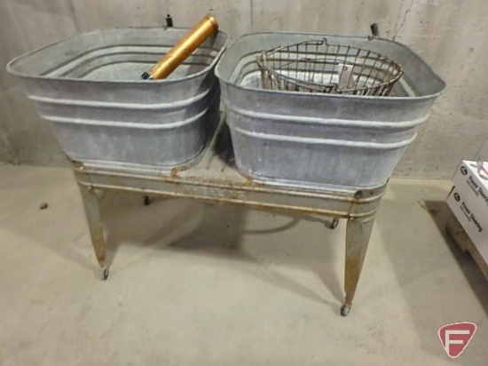 Wheeling wash basin stand on casters with (2) galvanized tubs, egg basket, and Pioneer fire