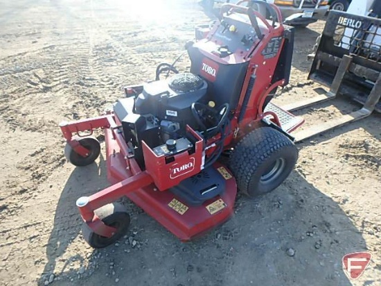 Toro Grandstand 60" standing mower, 25 HP, model 74549, SN: 314000446, 1,460 hrs showing