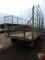 9 X 16 metal bale throw rack on John Deere 1065A wagon with flotation tires, extension pole
