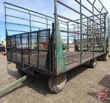 Steel 9x16 throw rack with metal floor on John Deere 10-ton running gear