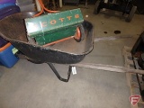 Metal wheelbarrow and Scott's 35-3 seeder