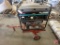 Onan Pro6000E gas generator on pull type cart, AC120v, 50amp
