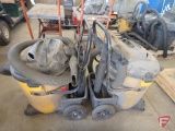(2) Shop-Vac 14 gallon wet/dry vacuums; both missing one front wheel