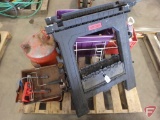 (2) Task Force poly saw horses, metal fuel can, paint trays, palm sander, oils, clamp light,