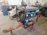 Onan Pro6000E gas generator on pull type cart, AC120v, 50amp