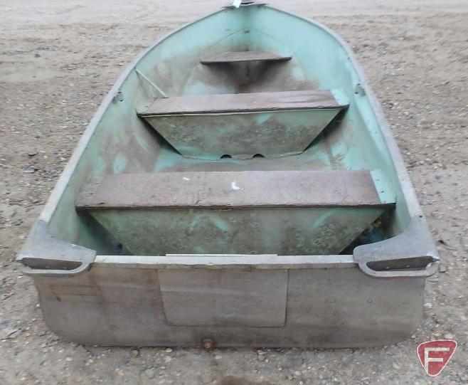 12' Lund aluminum fishing boat. - McLaughlin Auctioneers, LLC
