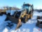 2009 John Deere 710J backhoe, sn: TQ710JX176012 with 2009 CAT H90 CS breaker attachment