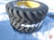 Pair of 18.4R38 Goodyear DynaTorque radial dual tractor tires on 10-bolt John Deere center rims