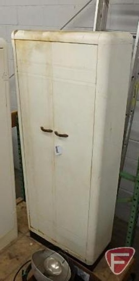 Metal cabinet, some rust damage, approx. 26" L x 12" W x 65" H