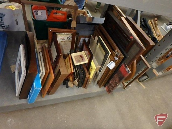 Various picture frames and wall hangings