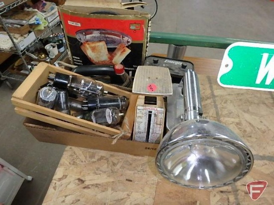 Vintage light bulbs, vintage clothes iron, 4-slice toaster, battery flashlight with extra battery