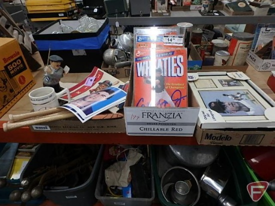 Sports memorabilia. Wheaties boxes in acrylic cases, Kirby Puckett pennant, Twins mug,