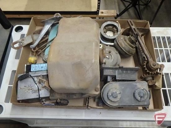 Automotive parts, Ford radio, coolant reservoir, and other parts, antique metal jack.