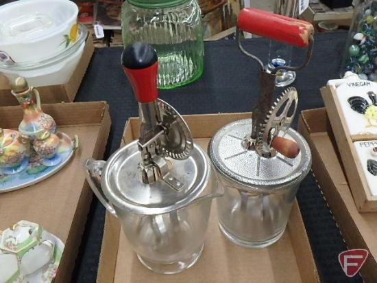 (2) vintage hand mixers with metal tops and glass bottoms