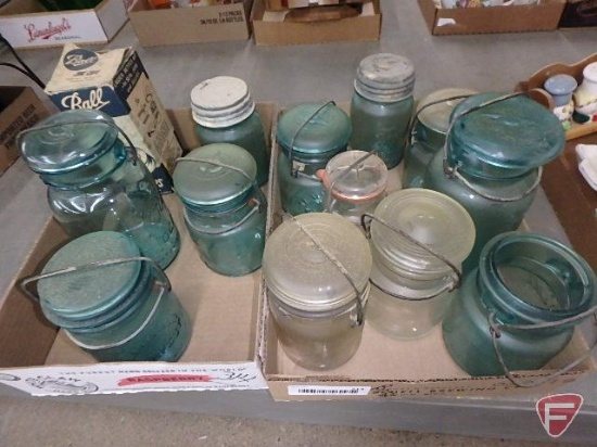 Clear and blue canning jars with glass and metal covers, Ball Zinc Caps. Contents of 2 boxes.